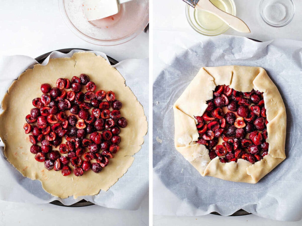 Assembling the rustic cherry tart on a piece of parchment paper on a baking sheet.