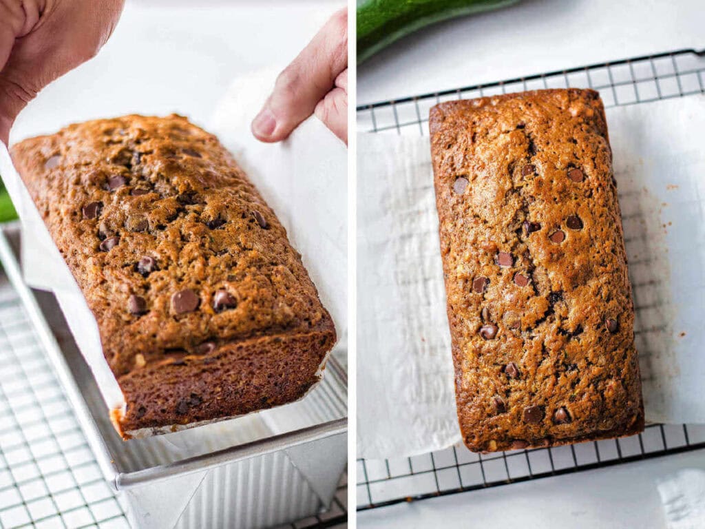 Lifting the chocolate chip zucchini bread out of the loaf pan and placing on a cooling rack.