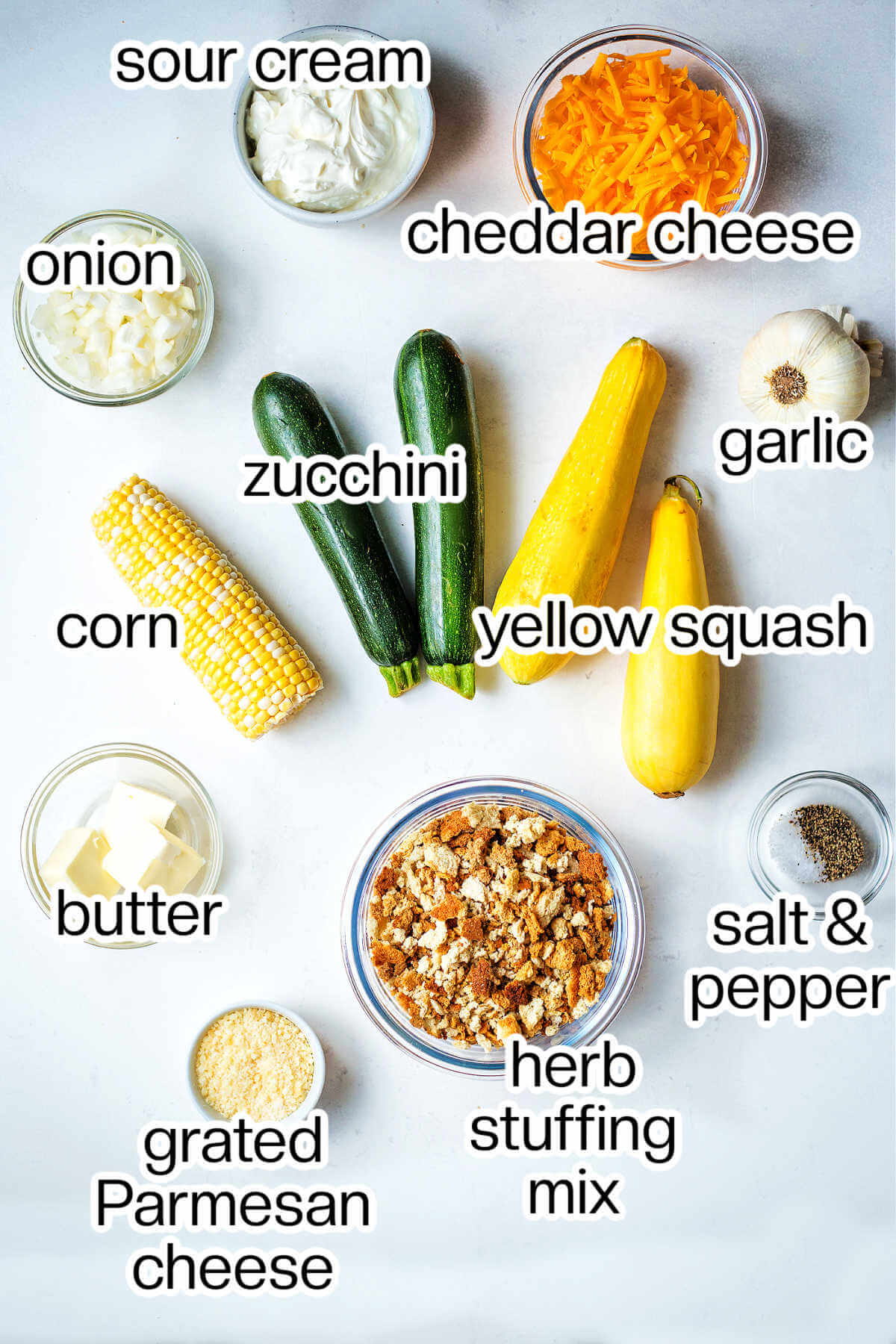 Labeled photo of the ingredients needed to make summer squash casserole.