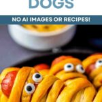 Halloween Mummy Dogs, Crescent Wrapped Hot Dogs on a plate.
