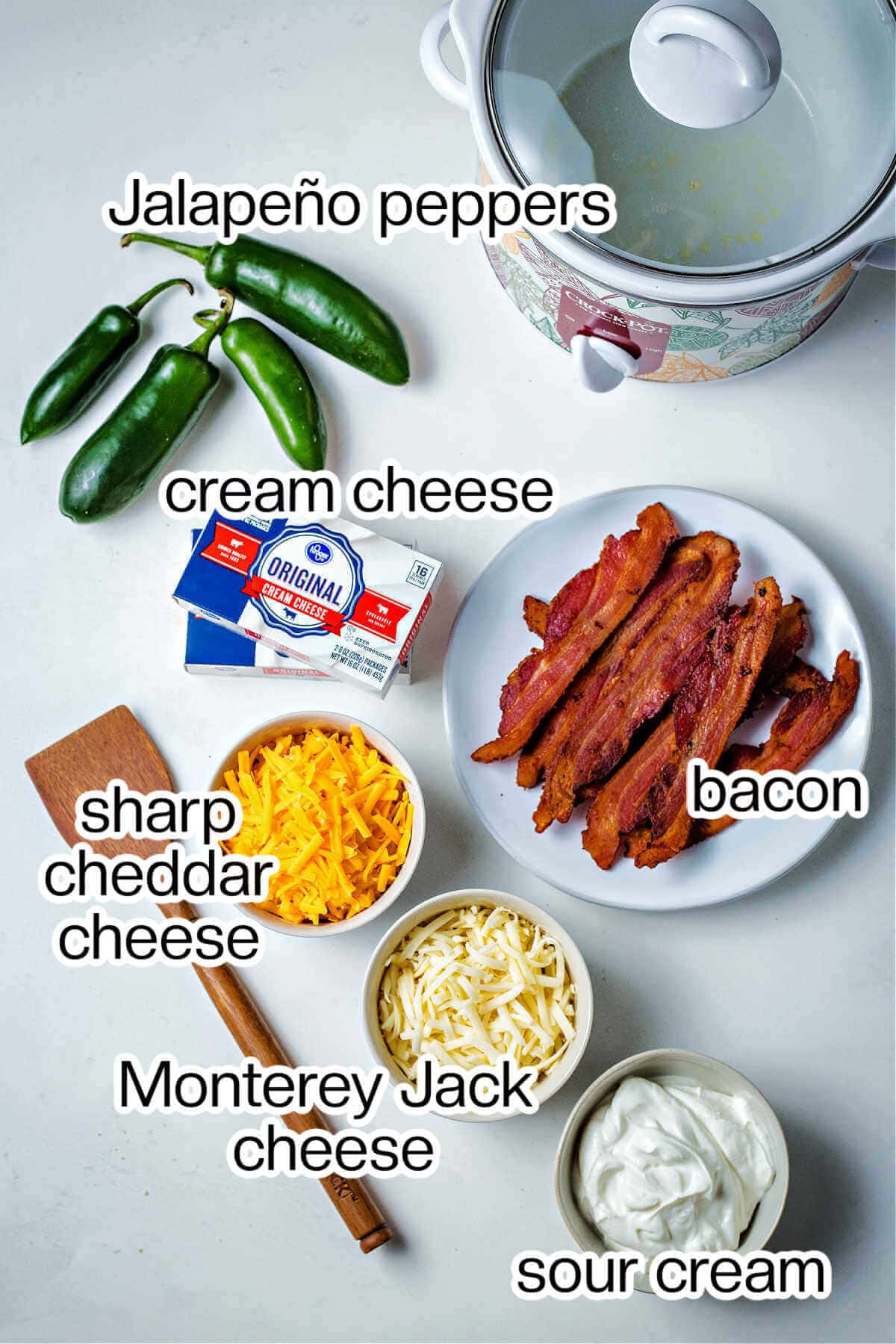 Ingredients needed to make jalapeno popper dip.