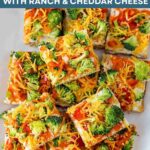 Slices of Cold Veggie Pizza Appetizer on a plate.