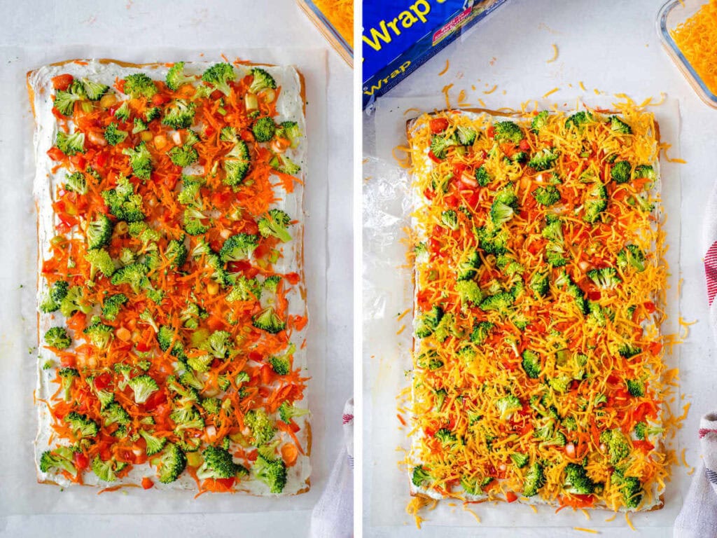 Assembling the crescent roll veggie pizza with fresh veggies and shredded cheddar cheese.