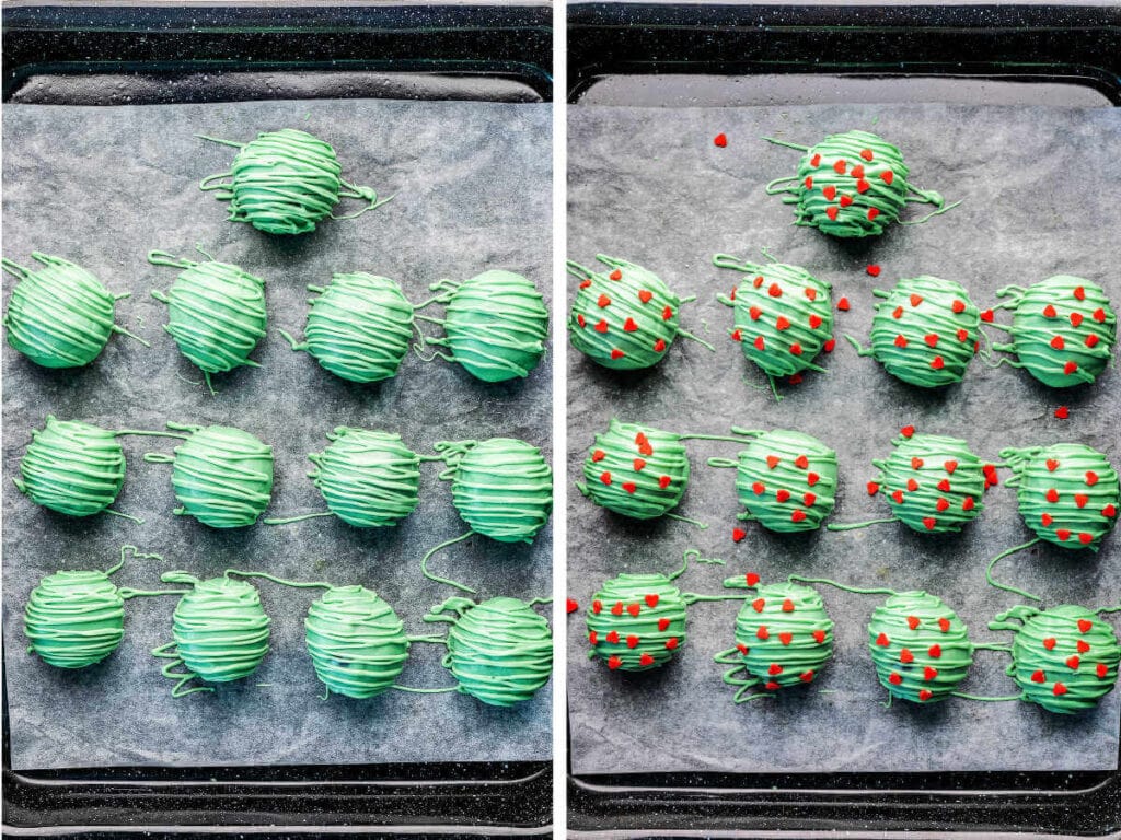 Decorating the Oreo balls with red candy hearts.