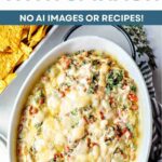 Cheesy Sausage Dip with tortilla chips in a serving bowl.