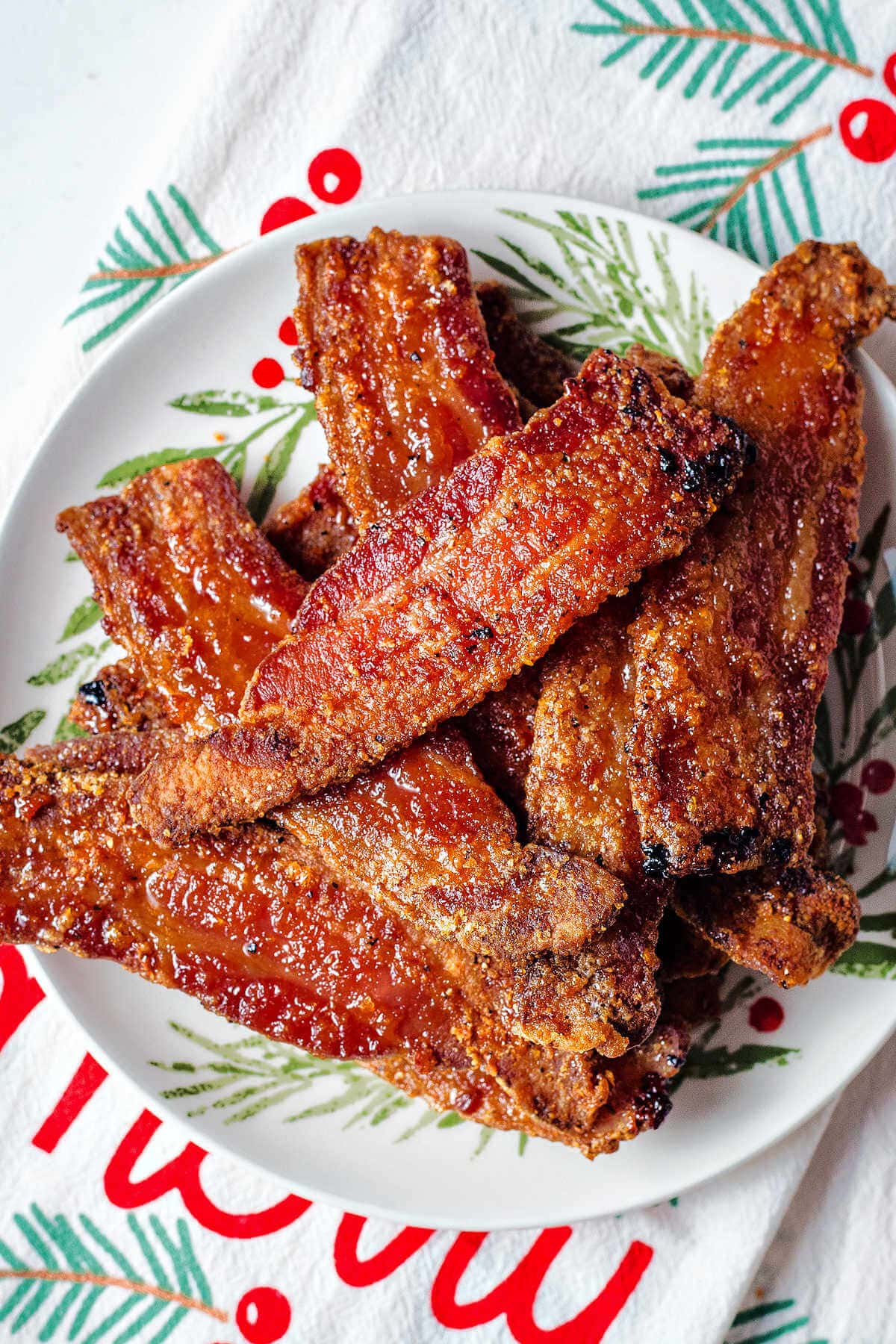 Plate of pig candy stacked on top of each other.