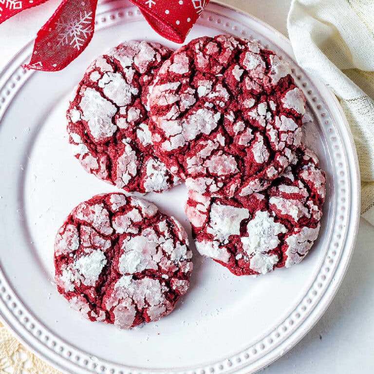 A plate of red velvet crinkle cookies.