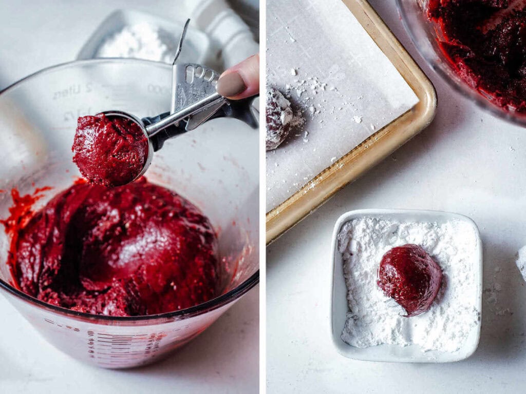 Using a cookie scoop to make cookie dough balls and dipping them in powdered sugar.