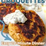 Salmon Croquettes with Tartar Sauce on a plate.