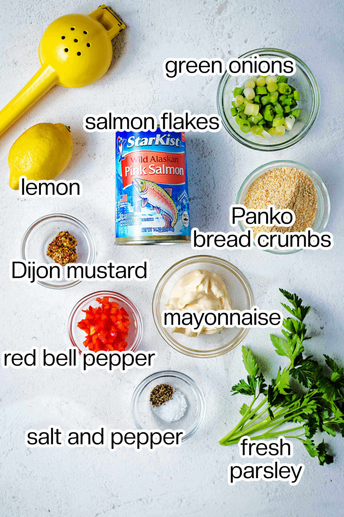 Ingredients for salmon croquettes on a table.