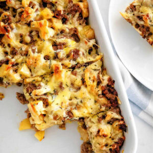 Sausage Apple Breakfast Casserole in a baking dish on the table.