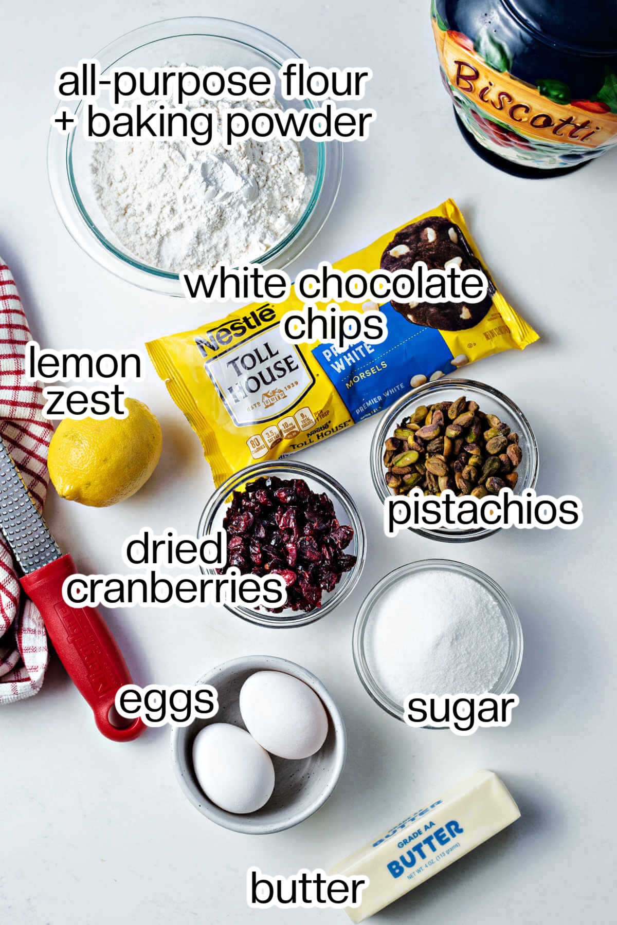 ingredients for cranberry pistachio biscotti on a table.