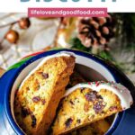 Cranberry Pistachio Biscotti in a cookie jar.