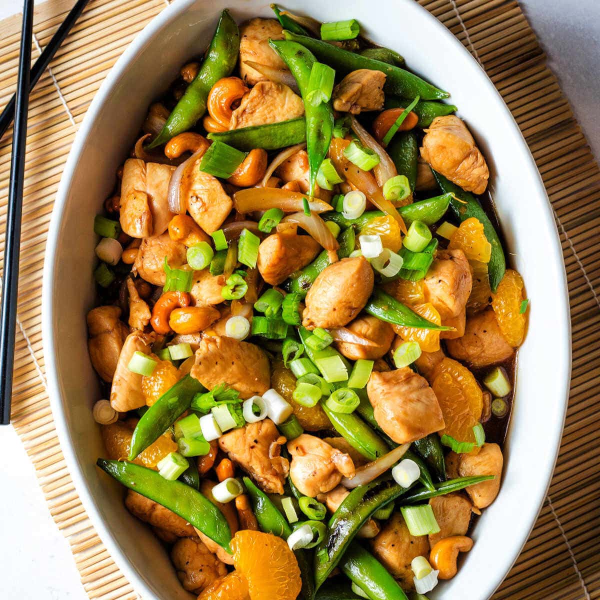 Overhead shot of chicken and cashew stir fry in a serving dish.