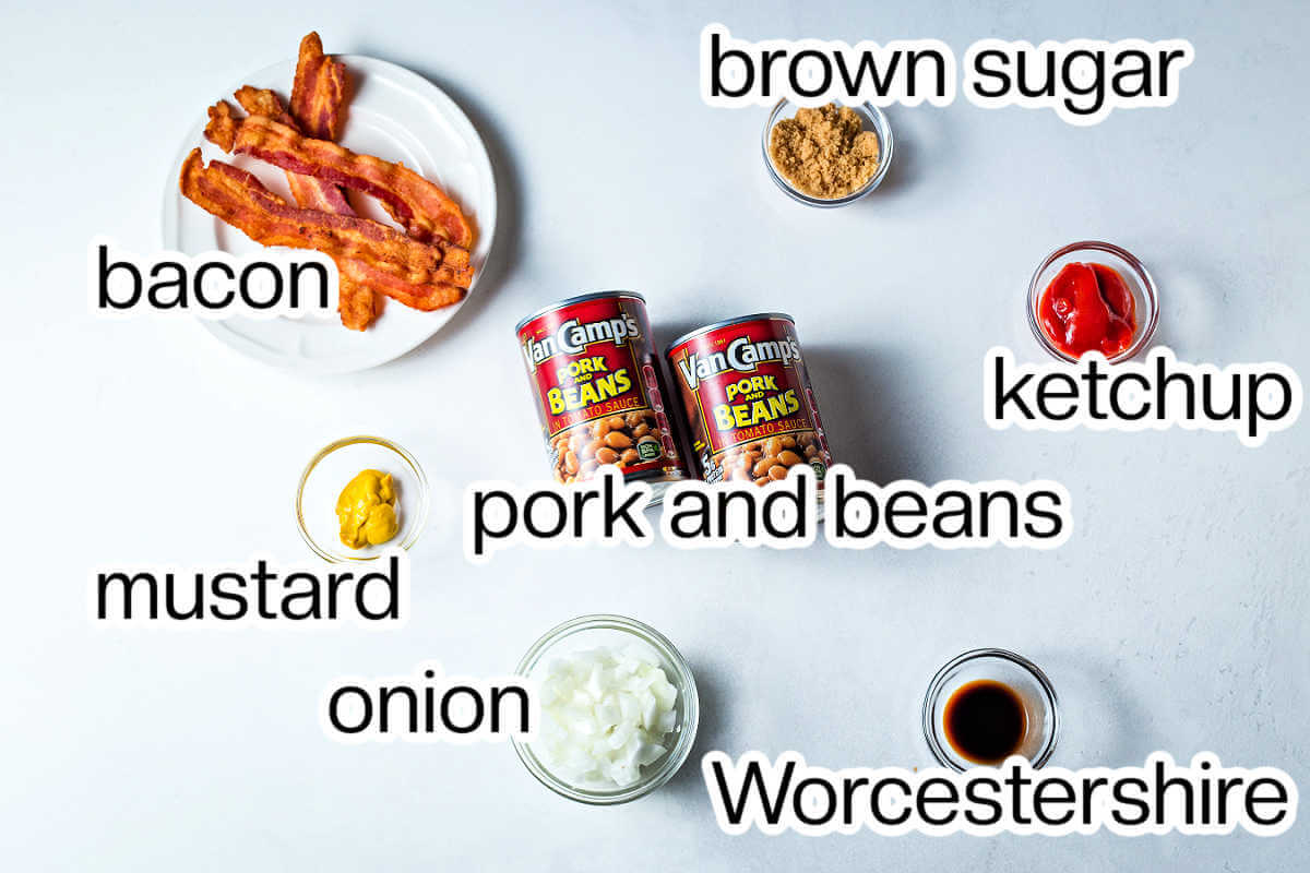 Ingredients for baked beans on a table.