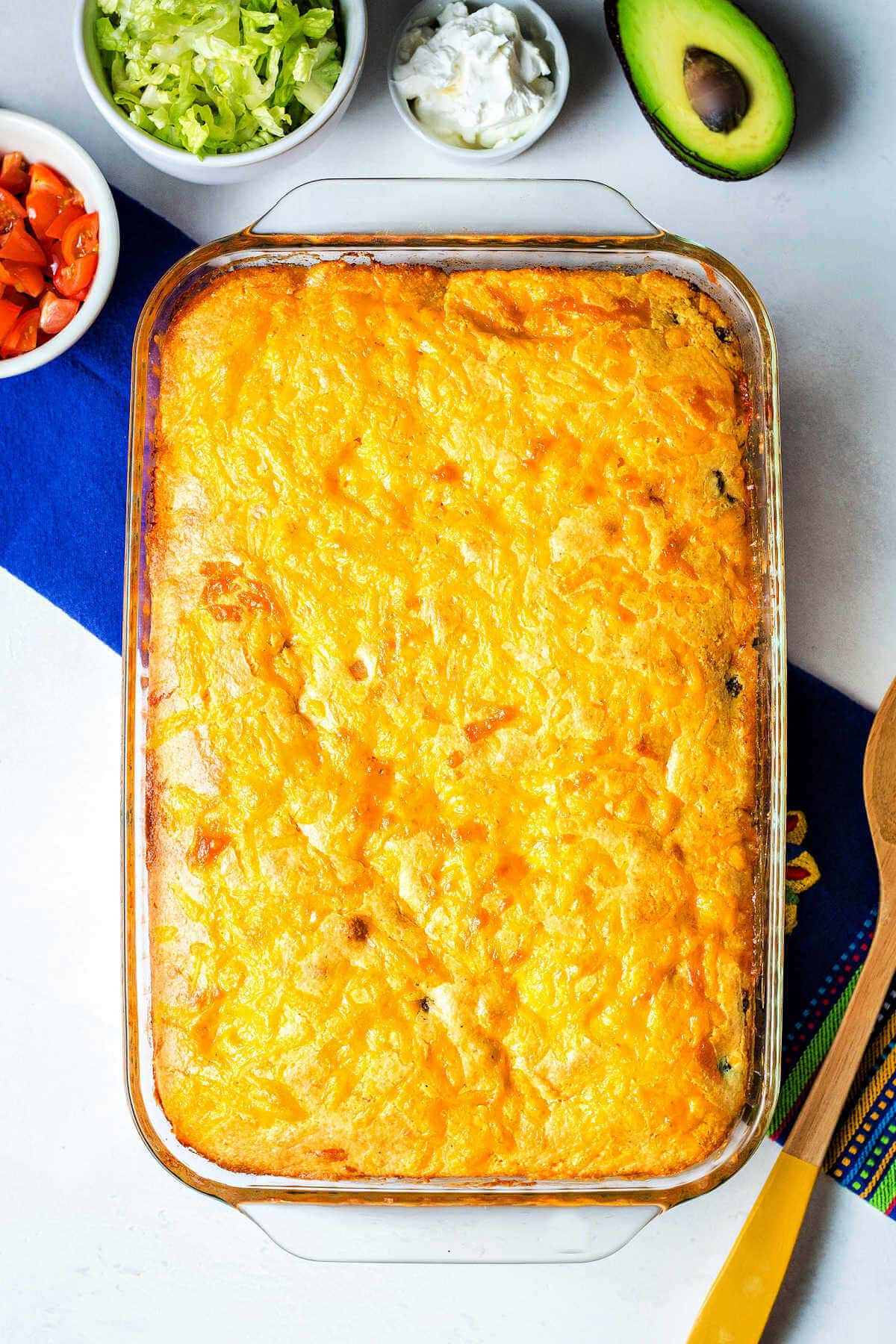 Overhead shot of baked tamale pie in a glass baking dish.