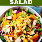 Asian Chicken Salad in a bowl with text overlay.