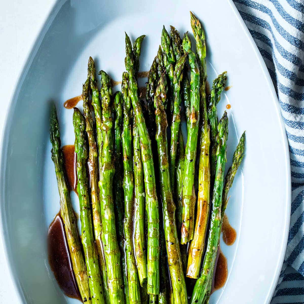 Browned Butter Roasted Asparagus in a serving bowl.