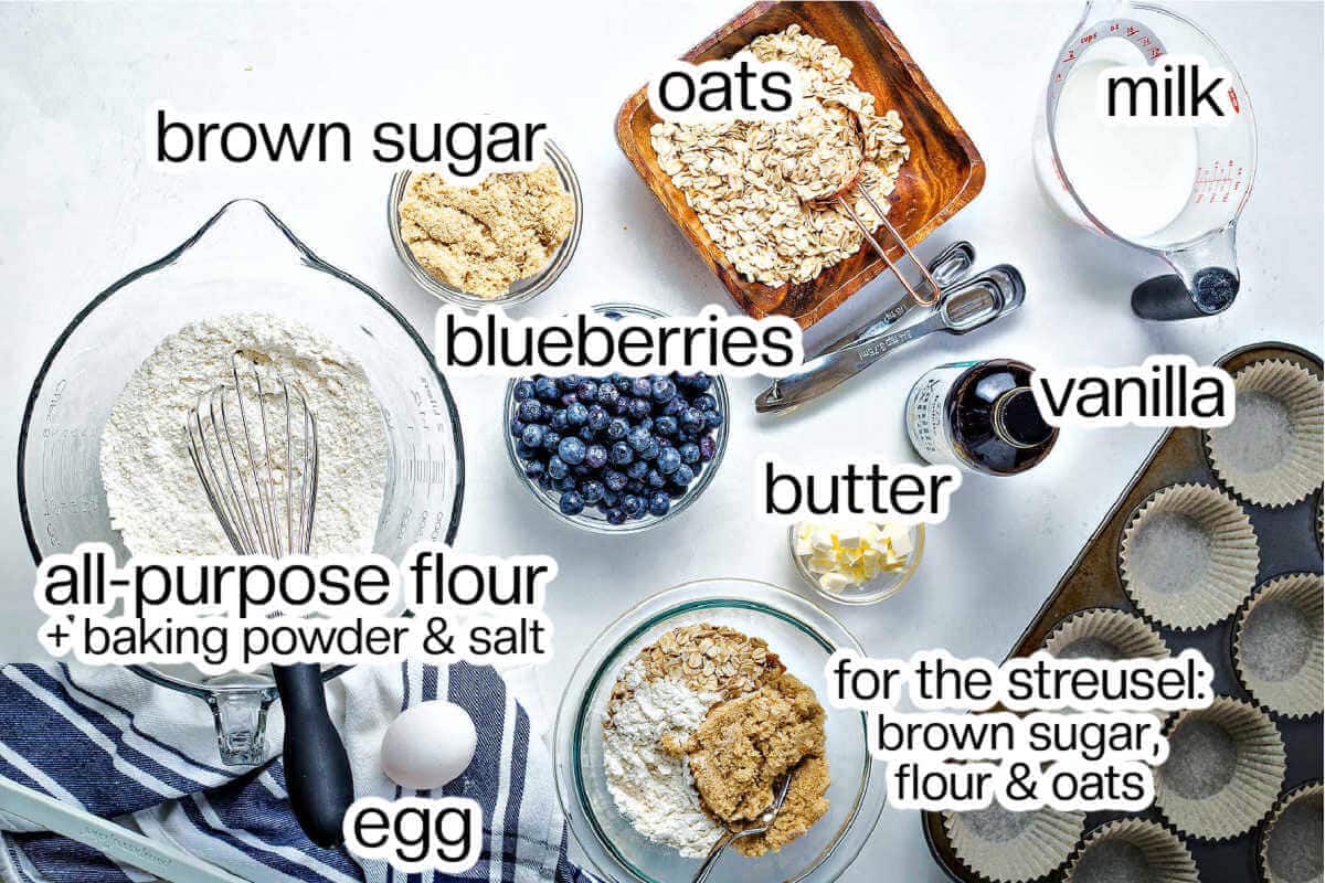 ingredients for blueberry oatmeal muffins on a table.